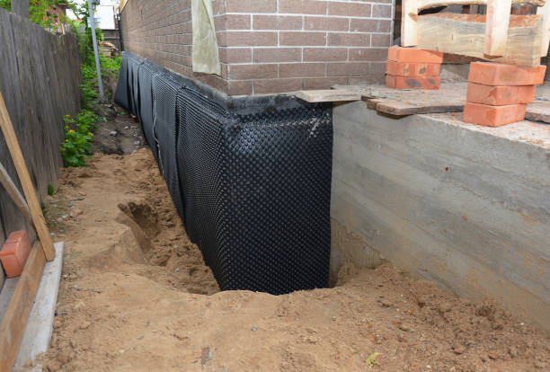 Happy homeowners after waterproofing job in Port Royal